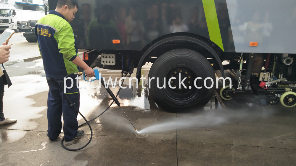 street sweeping truck high pressure washing